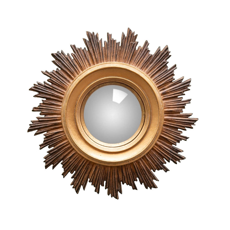 Decorative sunburst mirror with gold frame on a white background