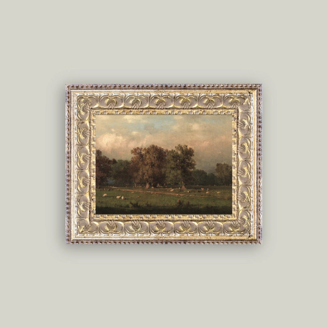 Framed painting of a landscape with trees and sheep on a light gray background
