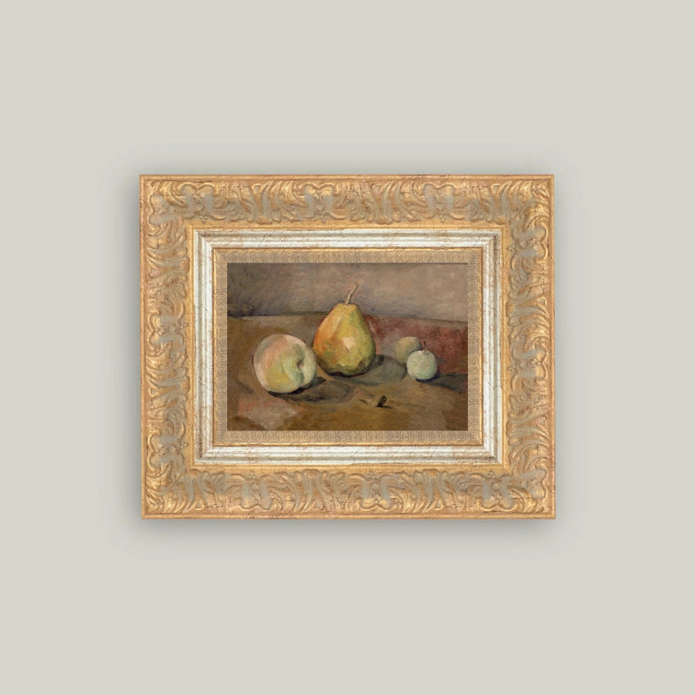 Framed still life painting of fruits on a gray wall