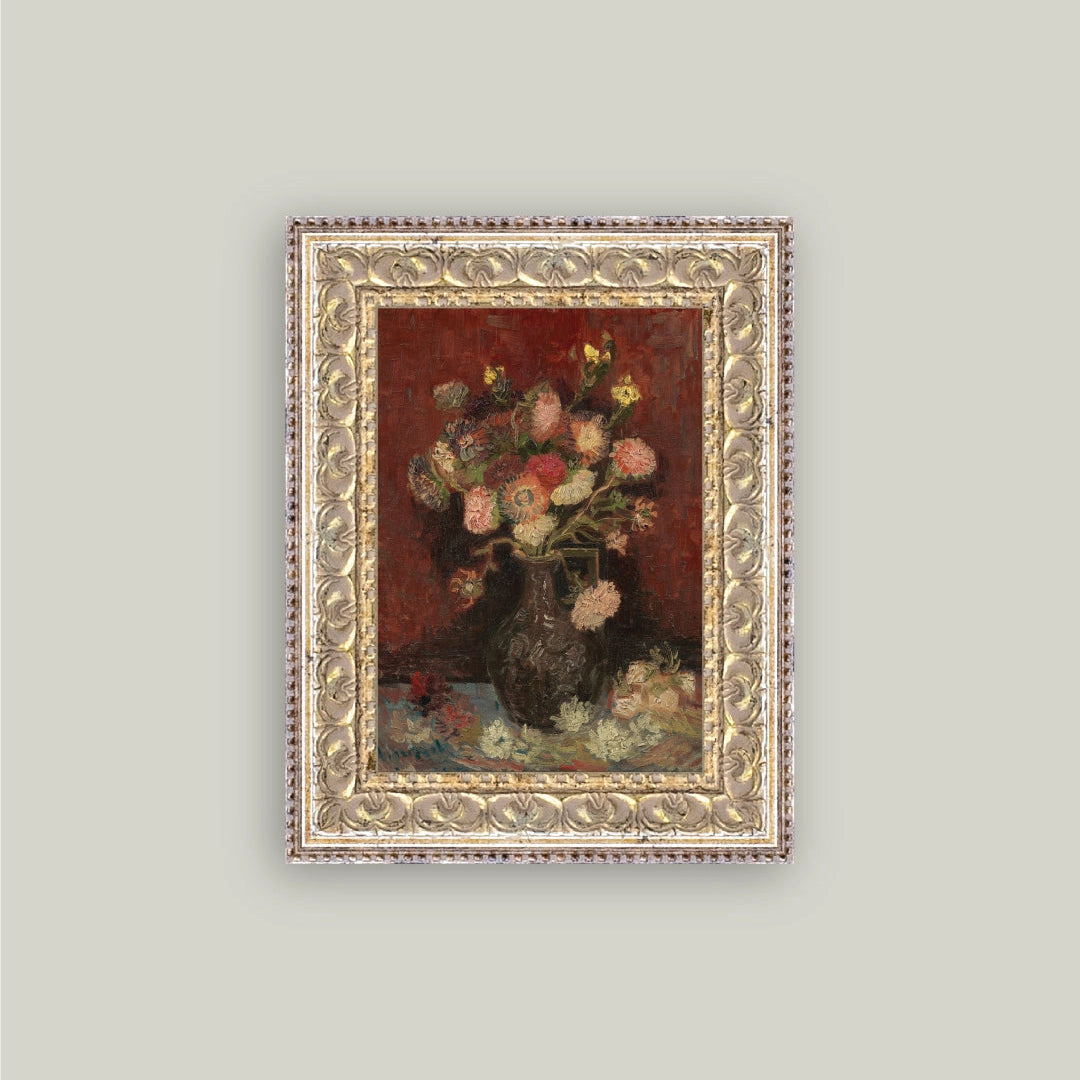 Framed painting of a still life with flowers on a gray background