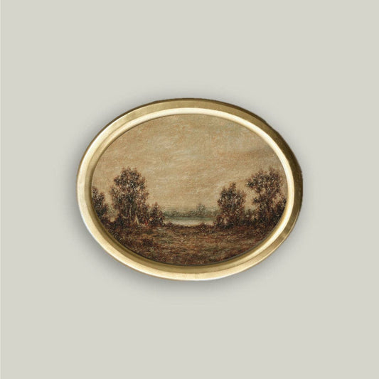 Decorative plate with a landscape design on a gray background