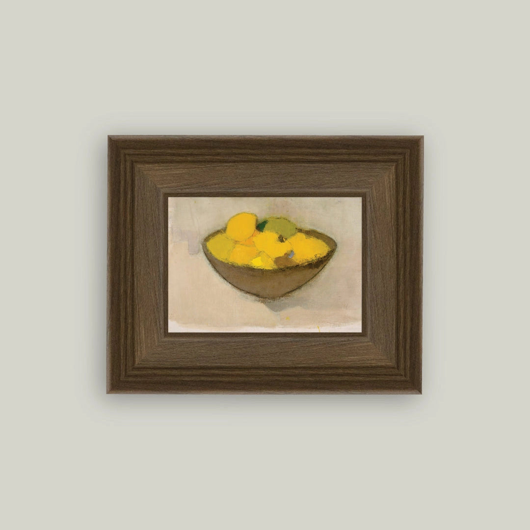 Framed artwork of a still life with lemons on a beige background