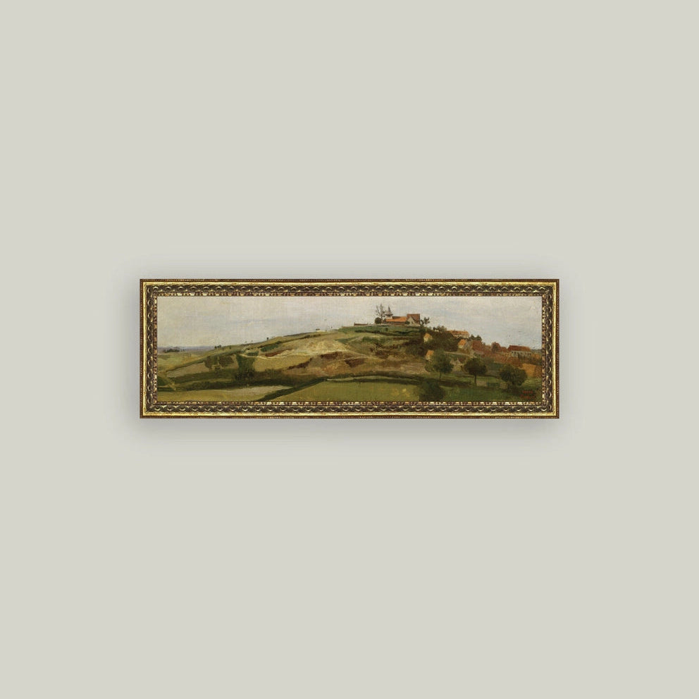 Framed landscape painting on a light gray wall