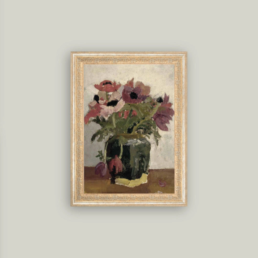 Framed artwork of a still life with flowers on a gray wall