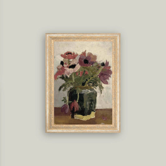 Framed artwork of a still life with flowers on a gray wall