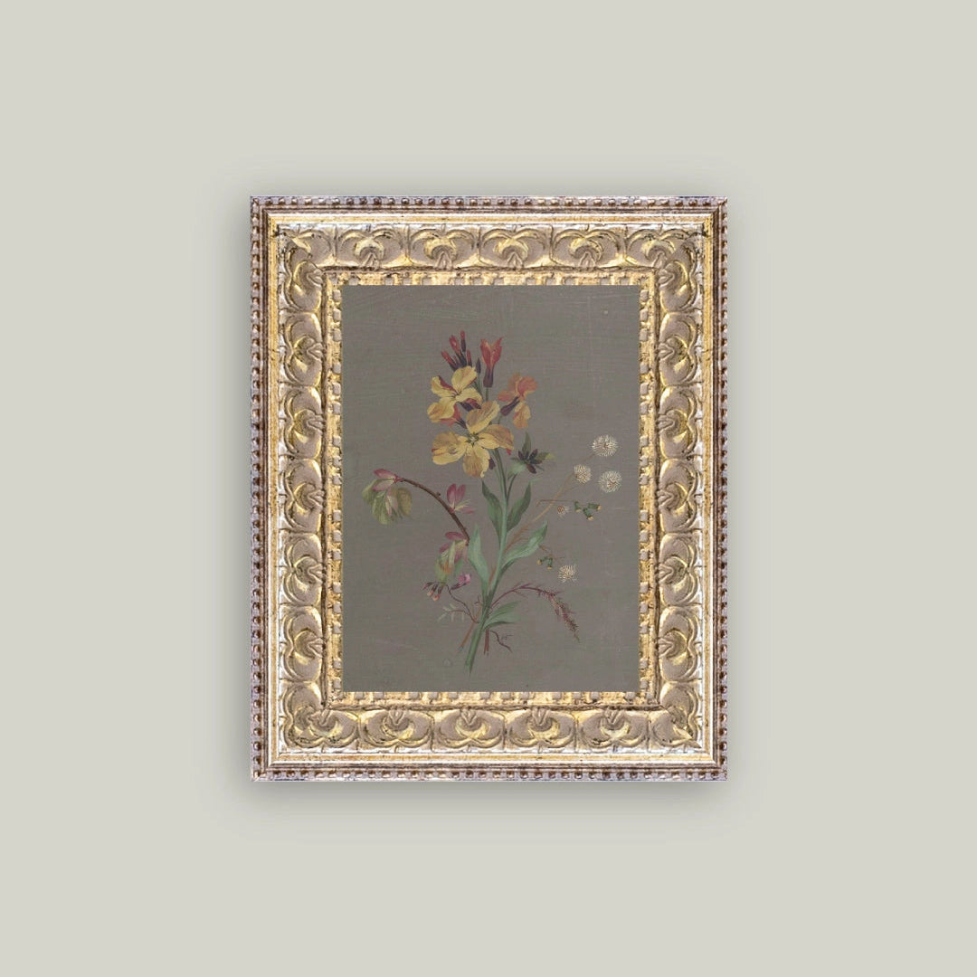 Decorative framed artwork with floral design on a plain background
